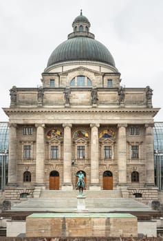 Munich, Germany - Dec 21, 2023 - Architecture exterior of Bayerische Staatskanzlei is a government building with Monument in front of entrance. Bavarian State Chancellery building (the former Bayerische Armeemuseum, Bavarian Army museum), Space for text, Selective focus.