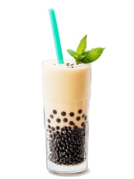 Chinese Bubble Tea in tall glass filled with black tapioca pearls and milk tea garnished. Drink isolated on transparent background.