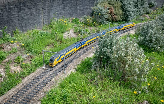 the haque,holland,09-07-2024:Toy dutch train in a miniature city in Madurodam park, Netherlands.