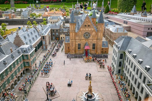 den haque,holland,9-07-2024:,Visitors enjoying the replicas of famous dutch buildings as a tourist attraction in Madurodam park buildings from all parts of the Netherlands.