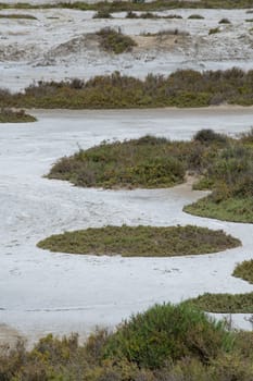 Pink Ponds In Man-made Salt Evaporation Pans In Camargue, Salin de Guiraud, France. High quality photo