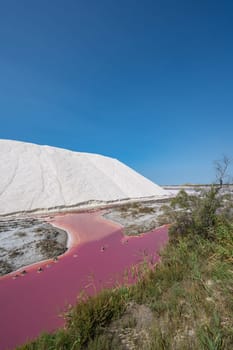 Pink Ponds In Man-made Salt Evaporation Pans In Camargue, Salin de Guiraud, France. High quality photo