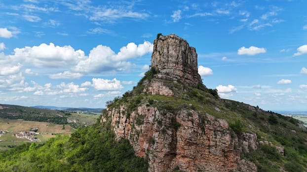 Saone et Loire,France,25-05-2024: , Solutre Pouilly, the rock of Solutre and vineyard fall in france near macon, high rock that people can climb