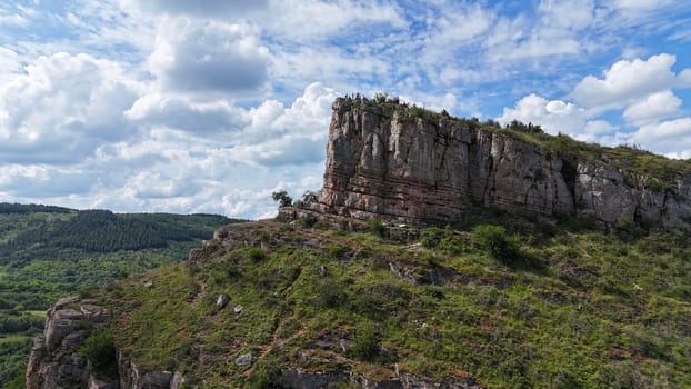 Saone et Loire,France,25-05-2024: , Solutre Pouilly, the rock of Solutre and vineyard fall in france near macon, high rock that people can climb