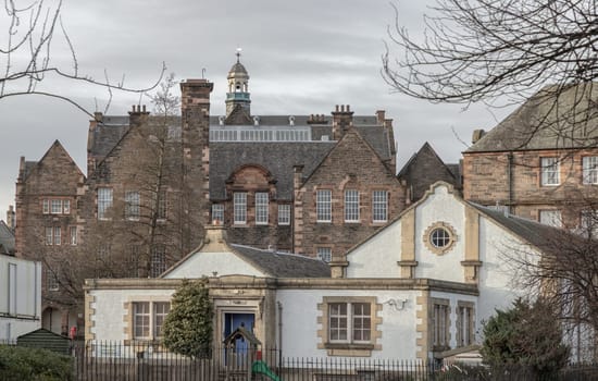 Edinburgh, Scotland - Jan 19, 2024 - Old Scottish Building with Broughton Primary in background at community of Broughton in Edinburgh, Scotland. Space for text, Selective focus.
