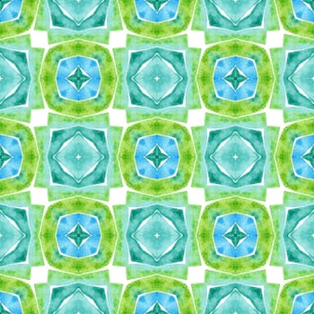 Watercolor ikat repeating tile border. Green interesting boho chic summer design. Textile ready radiant print, swimwear fabric, wallpaper, wrapping. Ikat repeating swimwear design.