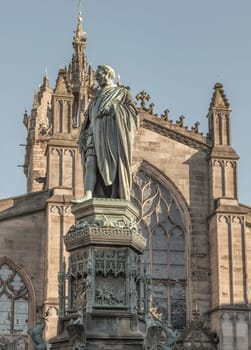 Edinburgh, Scotland - Jan 18, 2024 - Statue of Walter Francis Montagu Douglas Scott (Duke of Buccleuch) in front of St Giles' Cathedral or the High Kirk of Edinburgh. Space for text, Selective focus.