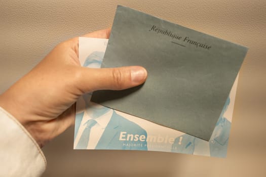 PARIS, FRANCE - JUNE 30, 2024: Ballots with the names of candidates for elections legislative Ensemble