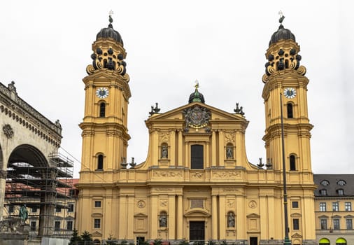 Munich, Germany - Dec 21, 2023 - Exterior architecture of The Theatine Church of St. Cajetan and Adelaide (Theatinerkirche St. Kajetan und Adelheid) a Catholic church on Odeonsplatz in Munich. Copy space, Selective focus.