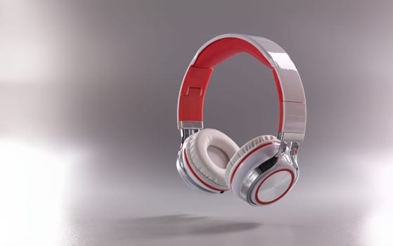 Close-up of modern headphones in red and white colour combination on grey background. Music, sound, technology and dj equipment concept