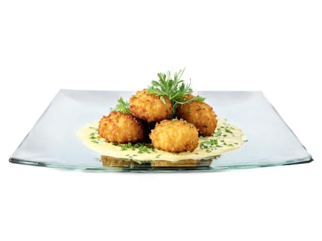 Tapas cod fritters with garlic aioli served on a transparent glass plate crispy and golden. Food isolated on transparent background.