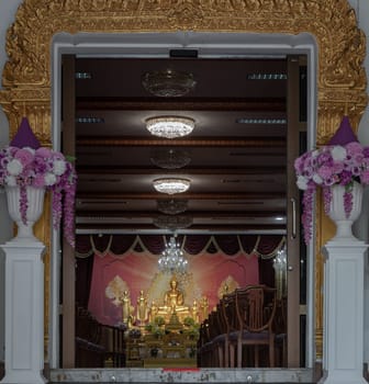 Bangkok, Thailand - May 22, 2024 - The Buddha image or Buddha statue in main monastery at Samphanthawong Saram Worawihan temple (Wat Ko). Copy space, Selective focus.