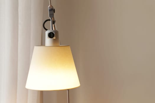 Fragment of a minimalist interior. Lamp shade.