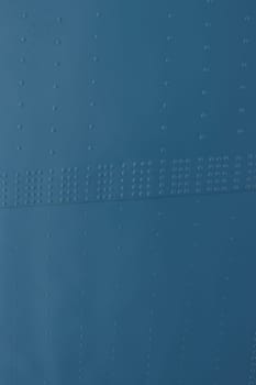 Protection of military equipment made of sheet metal with blue rivets.