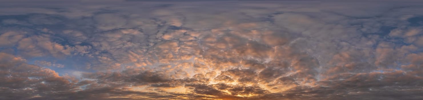 Golden sunset sky panorama Seamless spherical equirectangular 360-degree view with beautiful Stratocumulus clouds, setting sun - for use in 3D graphics as a sky dome or post-processing of drone images