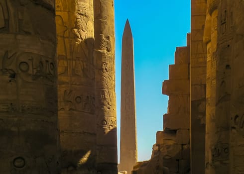 Luxor, Egypt - November  10, 2004: ancient temple columns with hieroglyphs, drawings and inscriptions at Karnak in Luxor, Egypt