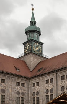 Munich, Germany - Dec 21, 2023 - Exterior View of Clock tower Munich Residenz munich in Renaissance baroque style with sky background. Festival Hall Building, Space for text, Selective focus.