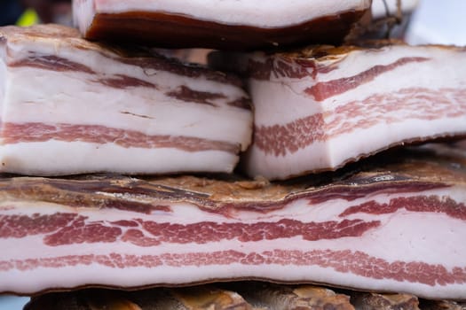 Pieces of salty high-fat meat. Salo or bacon. tasty meat.