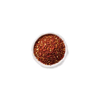 Aleppo pepper flakes deep red color coarse texture varied sizes Food and culinary concept. Food isolated on transparent background.
