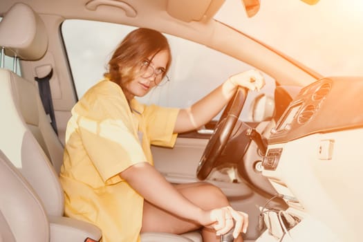 Relaxed business woman talking on video call on phone in automobile. Rested female professional saying bye on video chat in business car. Beautiful lady making video message in luxury car.