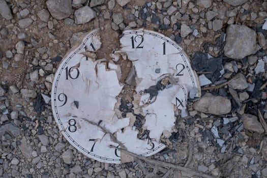 Classic Analog Clock In The Sand On The Rock ground.