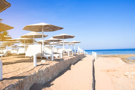 Sunny beach with wonderful sand coast and view on sea.
