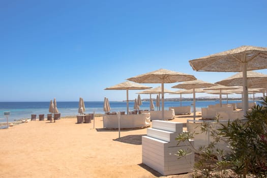Sunny beach with wonderful sand coast and view on sea.