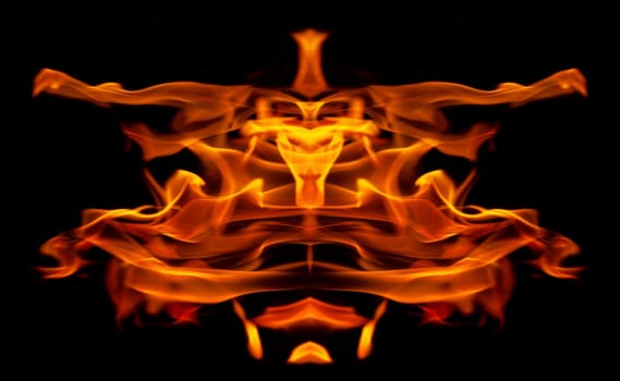 Decorative background with fire flames on black with copy space
