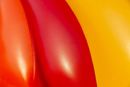 Abstract background and texture of a bright colourful plastic playground for playtime