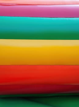 Abstract background and texture of a bright colourful plastic playground for playtime