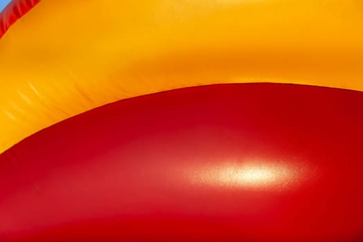 Abstract background and texture of a bright colourful plastic playground for playtime