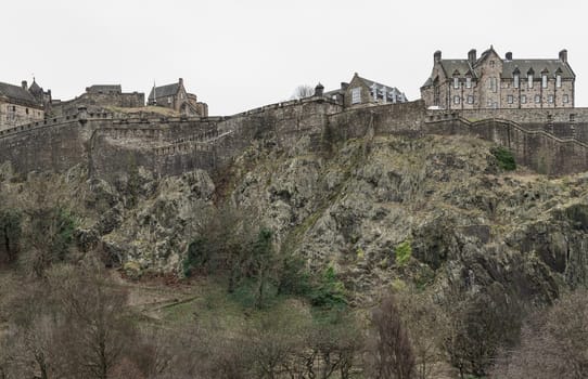 Edinburgh, Scotland - Jan 16, 2024 - Scenic view of Edinburgh Castle at the top of the hill is a historic fortress and is one of the most popular tourist attractions in Edinburgh city. Copy space, Selective focus.