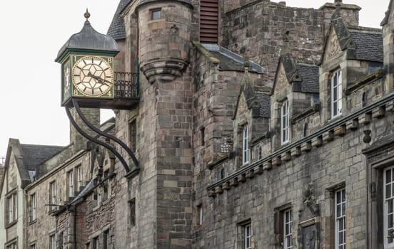 Edinburgh, Scotland - Jan 17, 2024 - Clock tower of the famous Canongate Tolbooth (The Tolbooth Tavern) is a historic landmark on Royal Mile in the Old Town of Edinburgh city. Space for text, Selective focus.