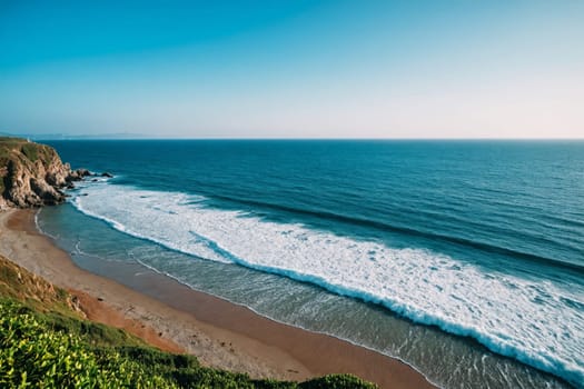 Step into an idyllic coastal haven with this captivating image of a sandy beach bordered by green cliffs. The charming white village perched on the hillside provides a picturesque backdrop, creating a perfect setting for a peaceful getaway by the sea.
