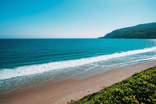 Step into an idyllic coastal haven with this captivating image of a sandy beach bordered by green cliffs. The charming white village perched on the hillside provides a picturesque backdrop, creating a perfect setting for a peaceful getaway by the sea.