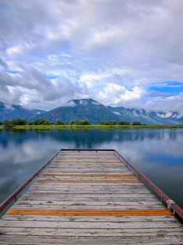 A floating dock on a calm section of Pend Oreille Lake just south east of Sandpoint, Idaho.