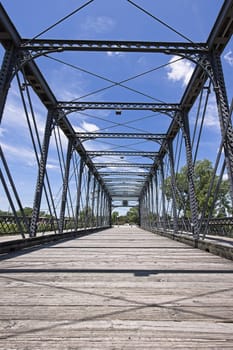 The old Wells Street Bridge on a bright day in downtown Fort Wayne, Indiana.