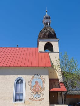 A side view of St. Joseph's catholic church on a sunny day in Leavenworth, Washington.