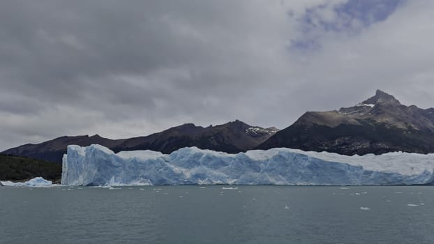 Boat trip footage showcasing the sheer cliffs of Perito Moreno Glacier, highlighting nature's majesty.