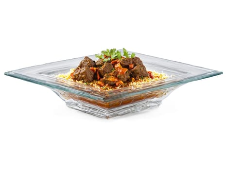 Lamb Madras with a hot and sour curry served on a transparent glass dish fiery. Food isolated on transparent background.