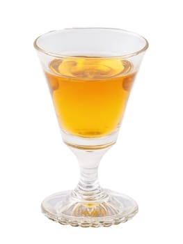 Czech Becherovka Shot of herbal bitter liqueur in shot glass deep amber in color. Drink isolated on transparent background.