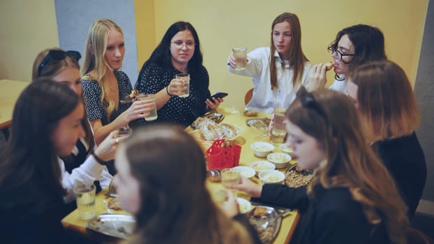 High school students eat in the cafeteria