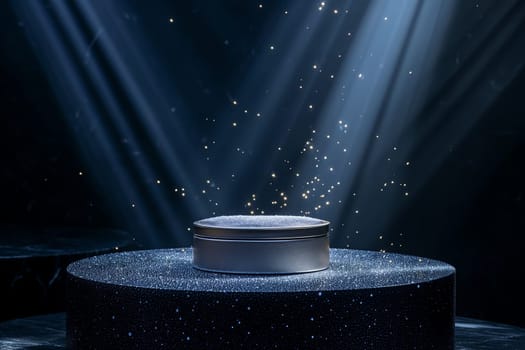 Silver box on a round table under a spotlight on a dark navy backgroun
