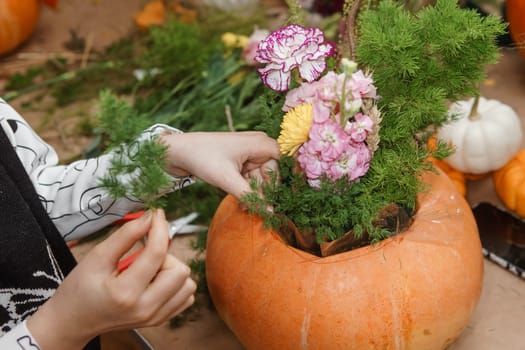Creating a floral composition in a pumpkin. Making decor with your own hands