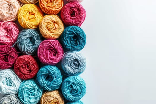 Brightly colored yarn rolls are neatly arranged in a grid on a white background, providing ample space for text and design elements.