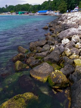 BULGARIA, VARNA - JUNE 06, 2013: Shore protection structures near the jetty made of large stones in Varna, Bulgaria