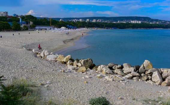 BULGARIA, VARNA - JUNE 06, 2013: urban sandy beach in autumn near the city of Varna, Bulgaria