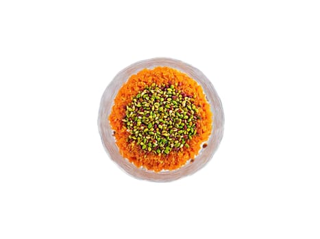 Gajar Halwa with Pistachios Carrot halwa garnished with pistachios served in a glass dish isolated. Food isolated on transparent background.