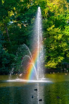 NANTES, FRANCE - SEPTEMBER 12, 2017: Rainbow in the fountain. The Botanical Garden is located across the street from Nantes Railway Station