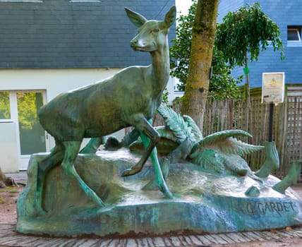 NANTES, FRANCE - SEPTEMBER 12, 2017: bronze sculpture of a deer in the interior in the city center of Nantes, France